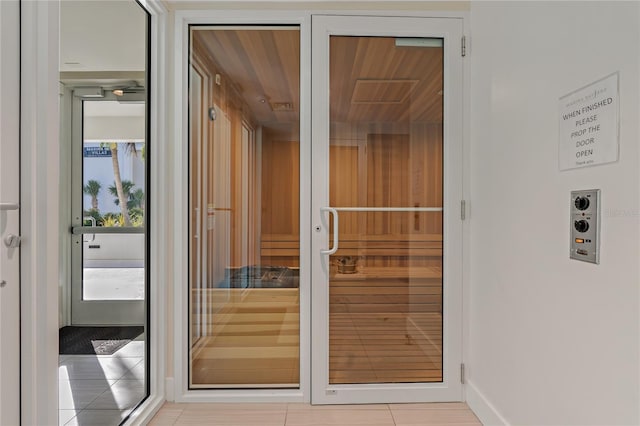 view of sauna featuring tile patterned floors