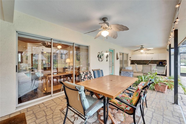 dining room featuring ceiling fan