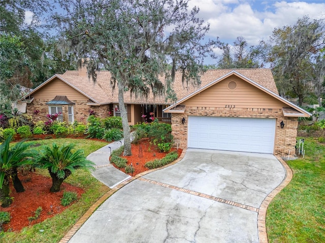 ranch-style house featuring a garage