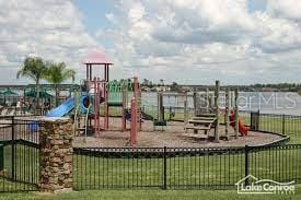 view of playground featuring a yard