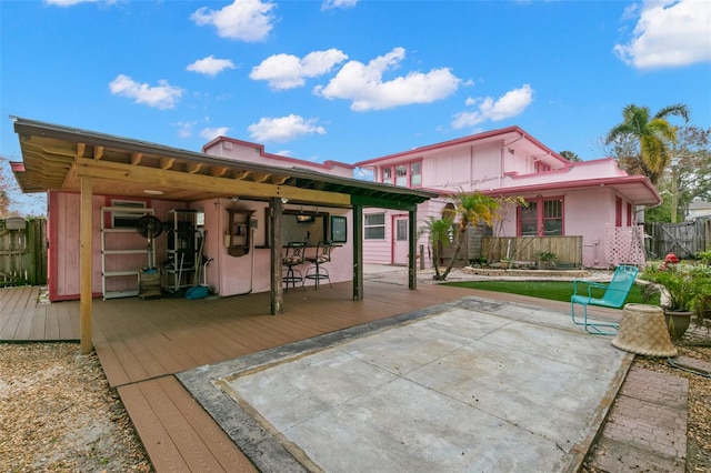 back of house with a patio