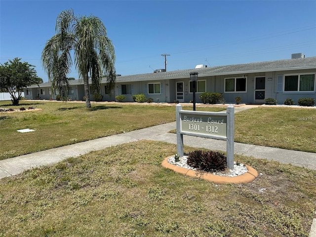 exterior space with a front yard