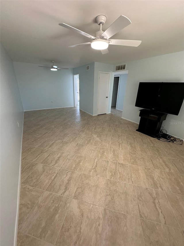 unfurnished living room featuring ceiling fan