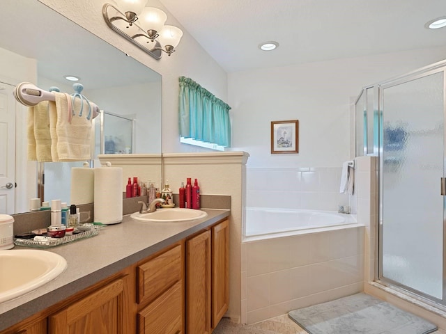 bathroom featuring vanity, tile patterned flooring, and plus walk in shower