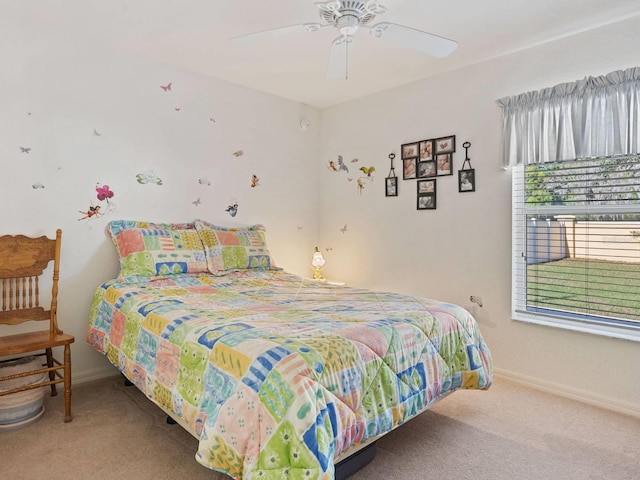 bedroom with ceiling fan and carpet floors