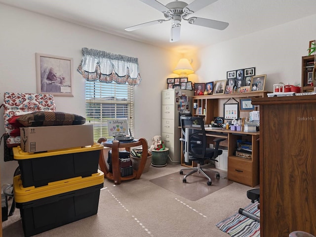 carpeted home office with ceiling fan