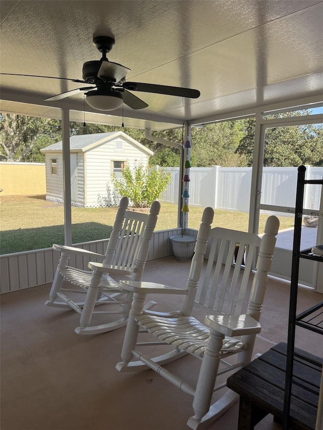 sunroom / solarium with ceiling fan