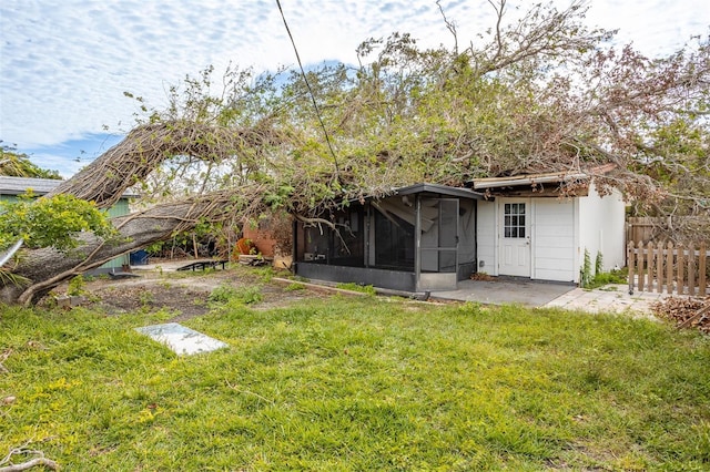 view of yard featuring a sunroom