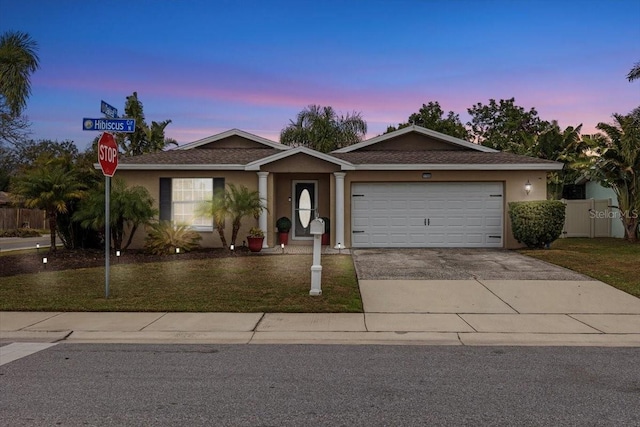 single story home with a garage