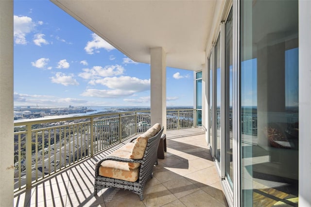 balcony featuring a water view