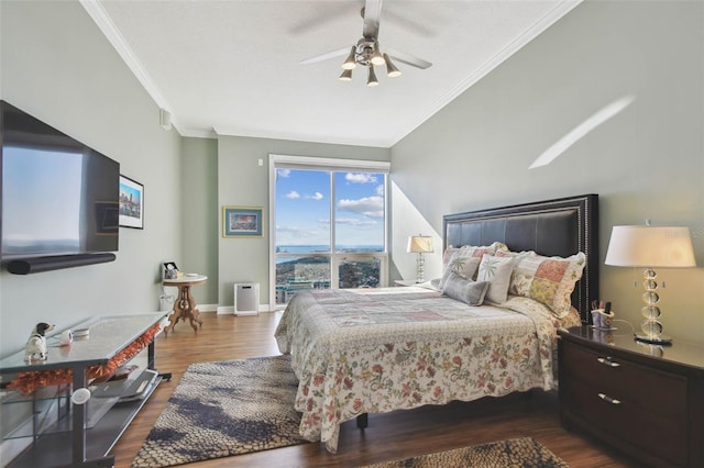 bedroom with ceiling fan, crown molding, dark wood-type flooring, and a textured ceiling