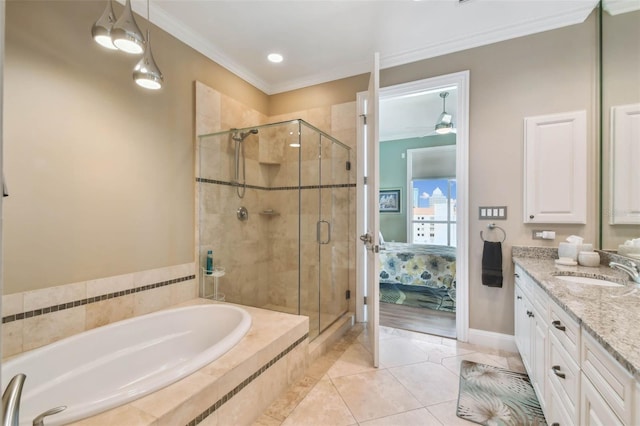 bathroom featuring ceiling fan, plus walk in shower, tile patterned flooring, vanity, and ornamental molding