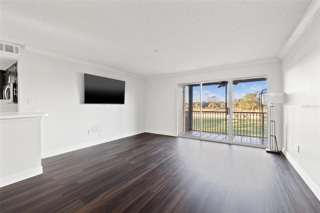 unfurnished room with crown molding, a textured ceiling, and dark hardwood / wood-style flooring