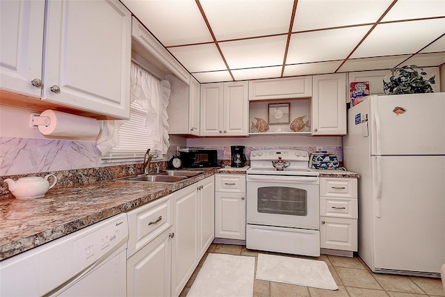 kitchen featuring white cabinetry, white appliances, sink, and premium range hood