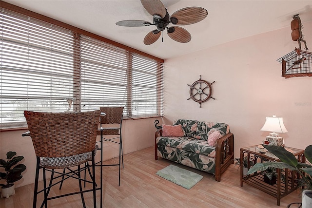 interior space with light hardwood / wood-style flooring and ceiling fan