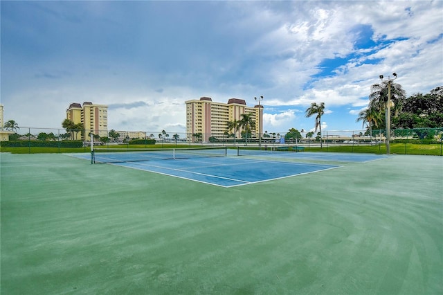 view of tennis court with basketball court