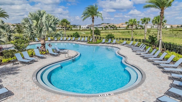 view of swimming pool featuring a patio