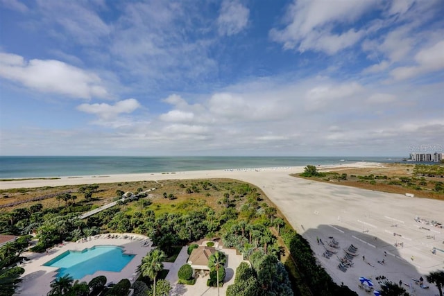 drone / aerial view with a view of the beach and a water view