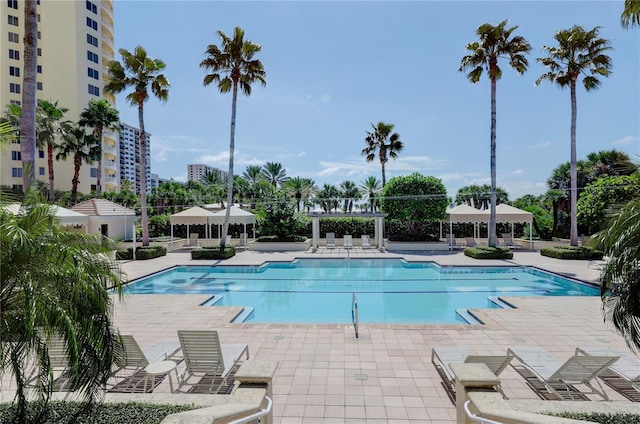 view of pool featuring a gazebo and a patio area