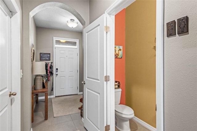 interior space featuring light tile patterned floors