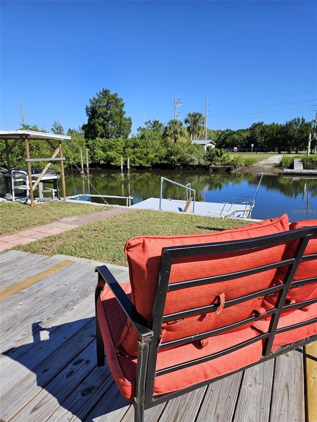 dock area with a water view