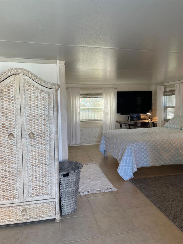 bedroom featuring tile patterned floors