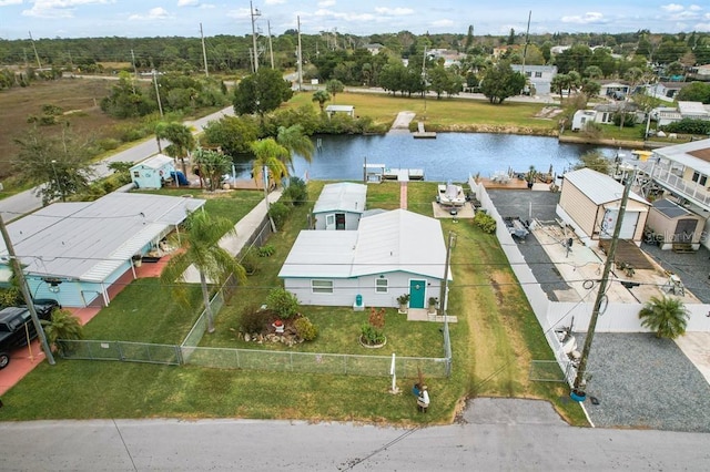 bird's eye view with a water view and a residential view