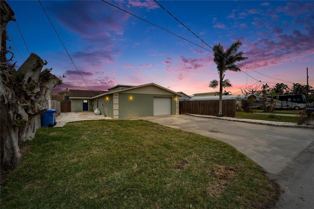 1022 Canal St, Ruskin, FL 33570 - view of front of house featuring driveway and an attached garage