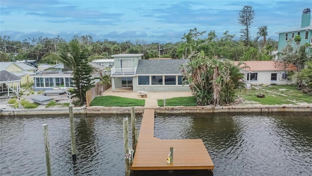 1022 Canal St, Ruskin, FL 33570 - dock with a water view and a patio
