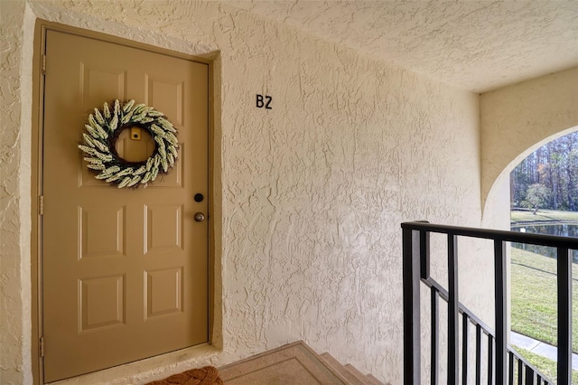 doorway to property with a balcony