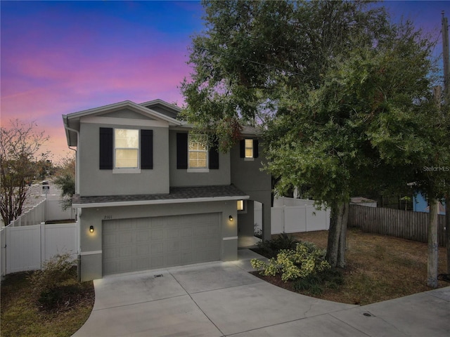 view of front of home with a garage