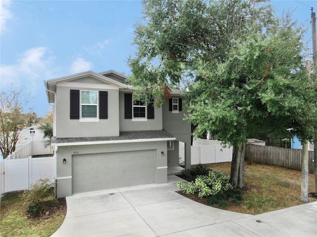 view of front of property with a garage