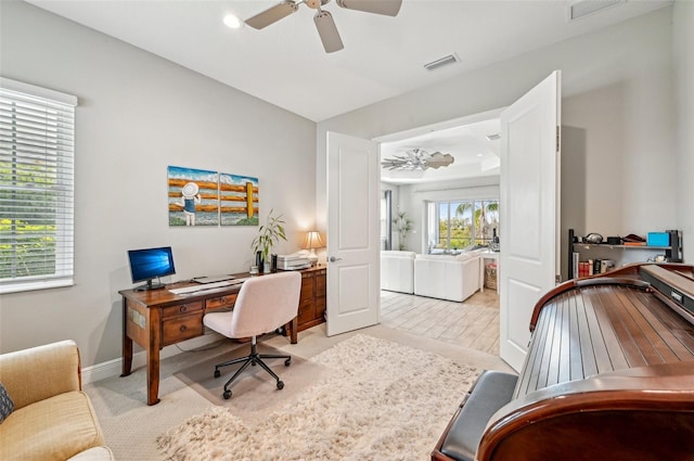 office area featuring light hardwood / wood-style floors and ceiling fan