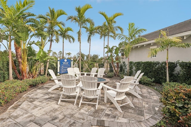 view of patio with an outdoor fire pit