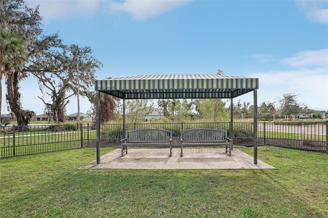 surrounding community featuring a gazebo and a yard