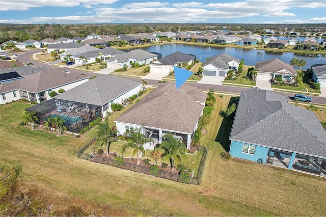 drone / aerial view with a water view