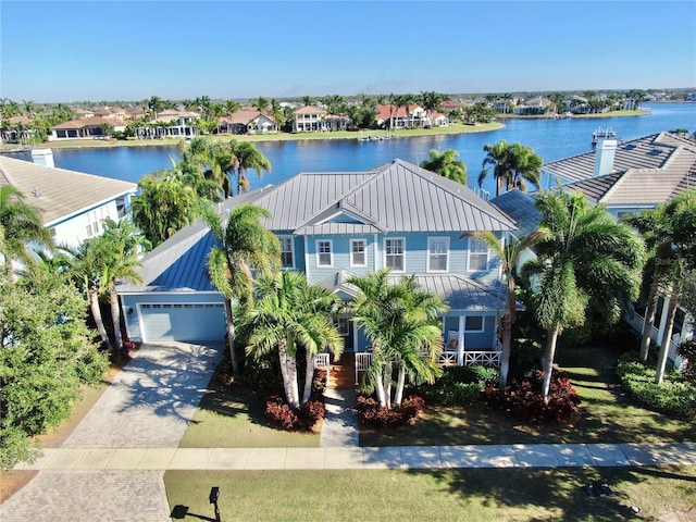 drone / aerial view featuring a water view