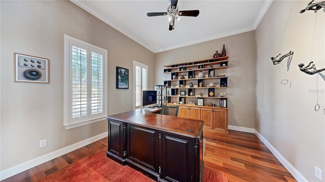 office space with dark hardwood / wood-style floors, a healthy amount of sunlight, and ornamental molding