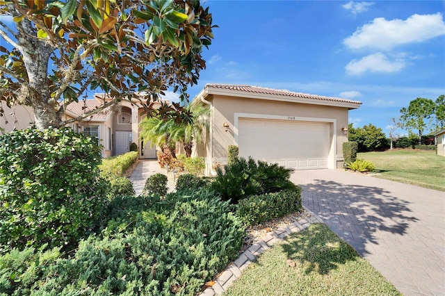 view of front of home with a garage