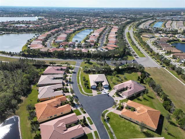 drone / aerial view with a water view