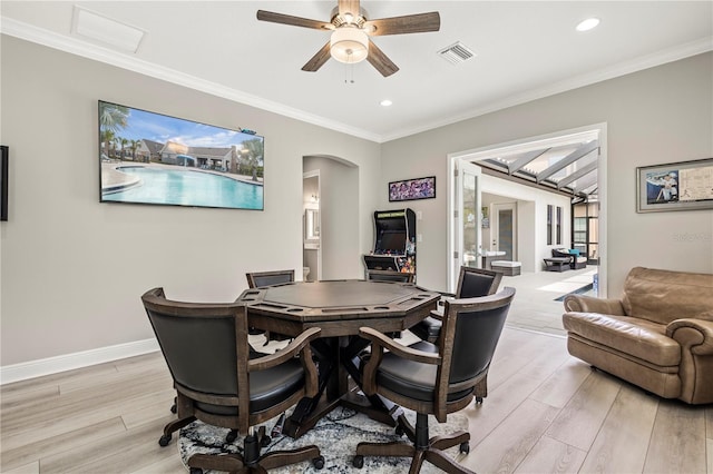 office featuring ceiling fan, light hardwood / wood-style flooring, and crown molding