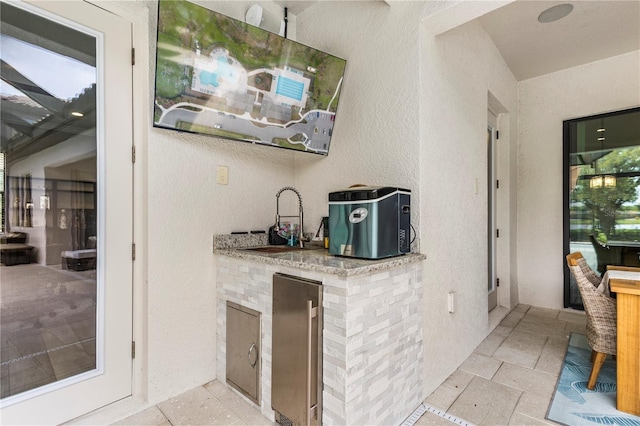 bar featuring sink