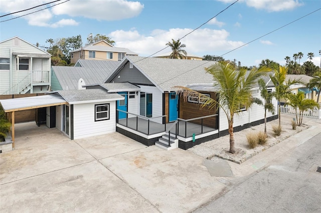 view of front of home featuring a carport