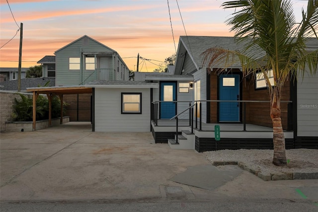 exterior space with a carport