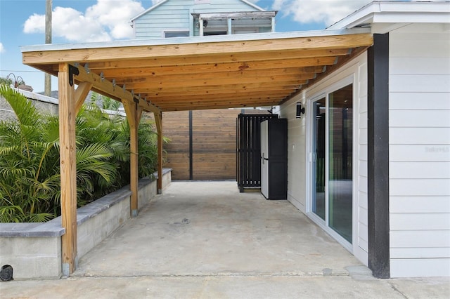 view of patio / terrace with a carport