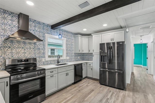 kitchen with dishwasher, wall chimney range hood, sink, fridge with ice dispenser, and stainless steel electric range