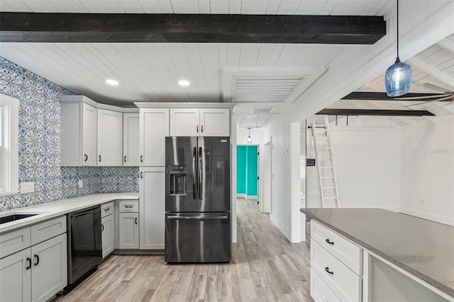 kitchen featuring light hardwood / wood-style floors, dishwasher, white cabinetry, refrigerator with ice dispenser, and pendant lighting