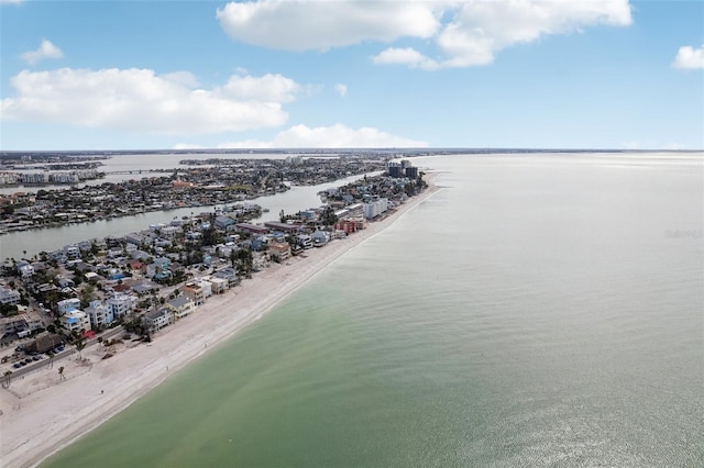 aerial view with a water view and a beach view