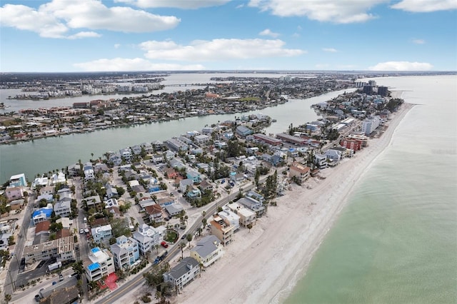 drone / aerial view with a water view and a view of the beach