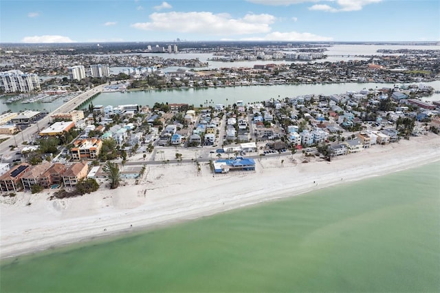 birds eye view of property featuring a water view and a view of the beach